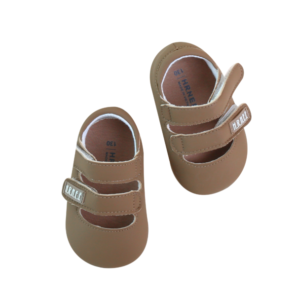 Brown two-strap leather shoes