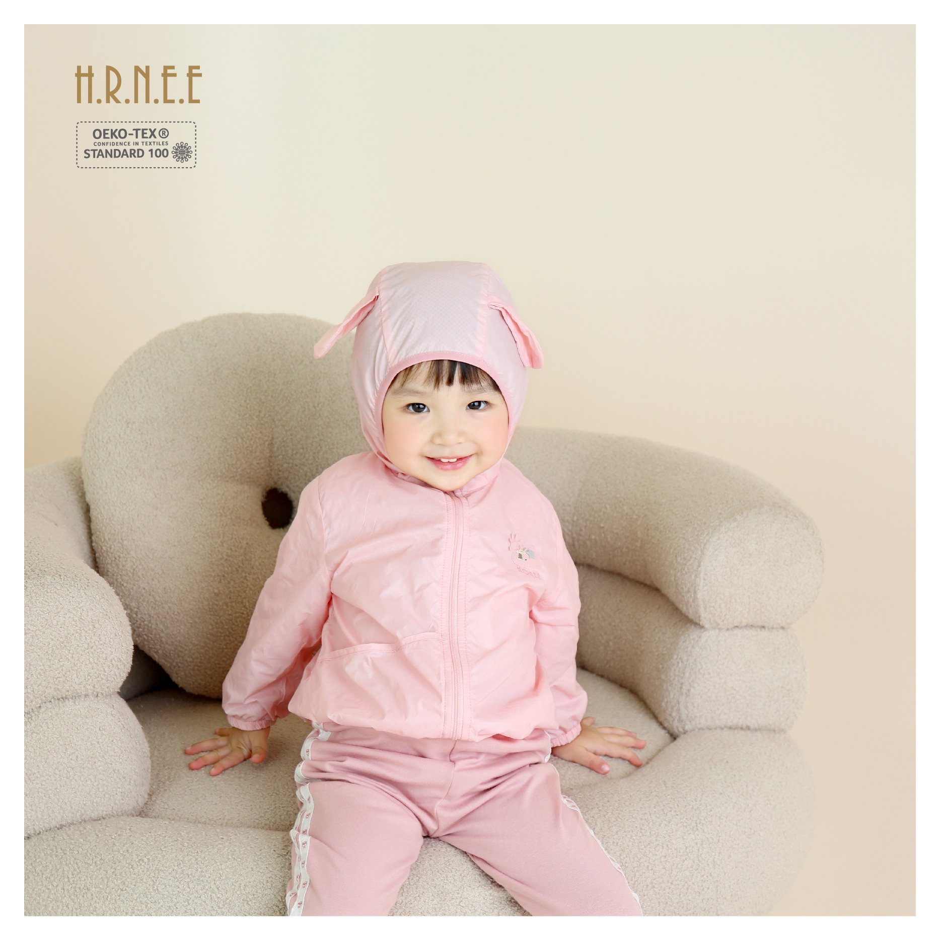 z5700978222655_5ec65c906c18d268eb7d6d4e03ebc628 a baby girl wearing windbreaker jacket